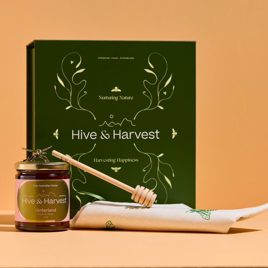 Honey Host Gift Set with honey, dipper, linen tea towel and brass bee ornament