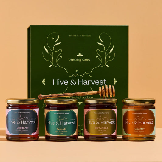 Queensland Nectar Trail Deluxe Collection with four raw honeys and olive wood dipper in gift box